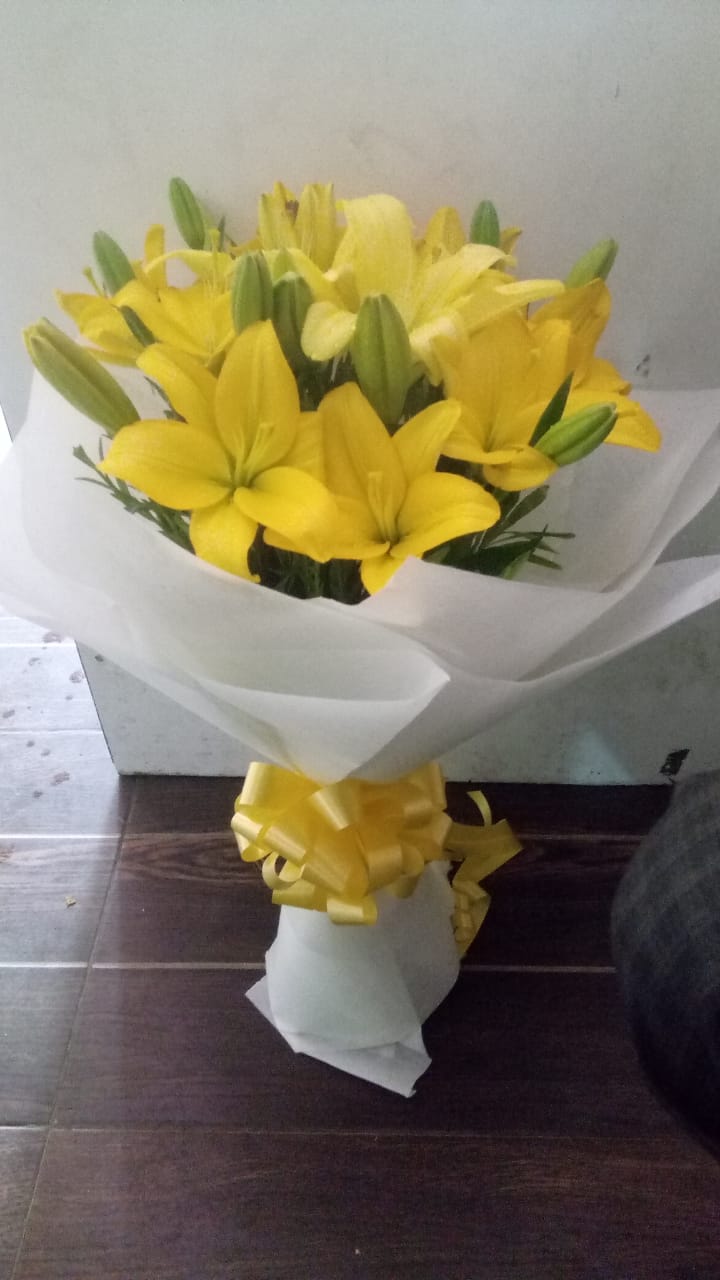 Yellow Asiatic Lilliums in White Paper delivery in Chennai