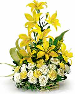 Lillium and Roses arranged in a Basket