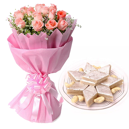 12 Pink Roses in Paper with 1/2kg Kaju Berfi delivery in Noida