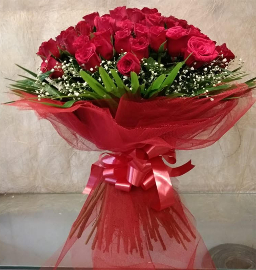 Bouquet of 50 Red Rose in Net Packing delivery in Chennai