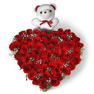 Heart Shape Arrangement of 50 Red roses with small cute teddy